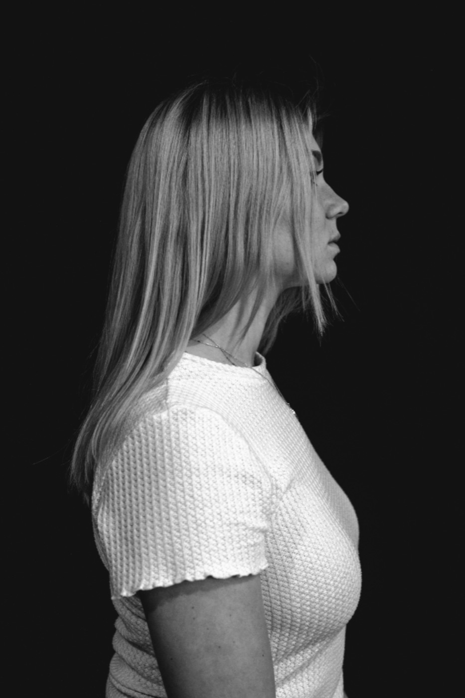 Black-and-white profile portrait of Ingrid S., movement director